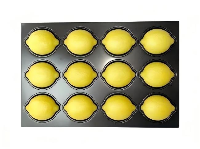 A neat stack of clean square pans on a shelf