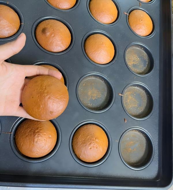 A ruined cake stuck firmly inside a baking pan